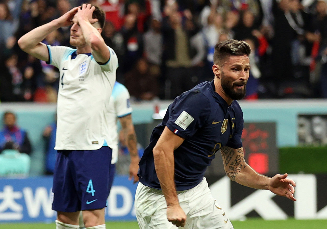 France players celebrating after Olivier Giroud scores against England in the World Cup quarterfinal