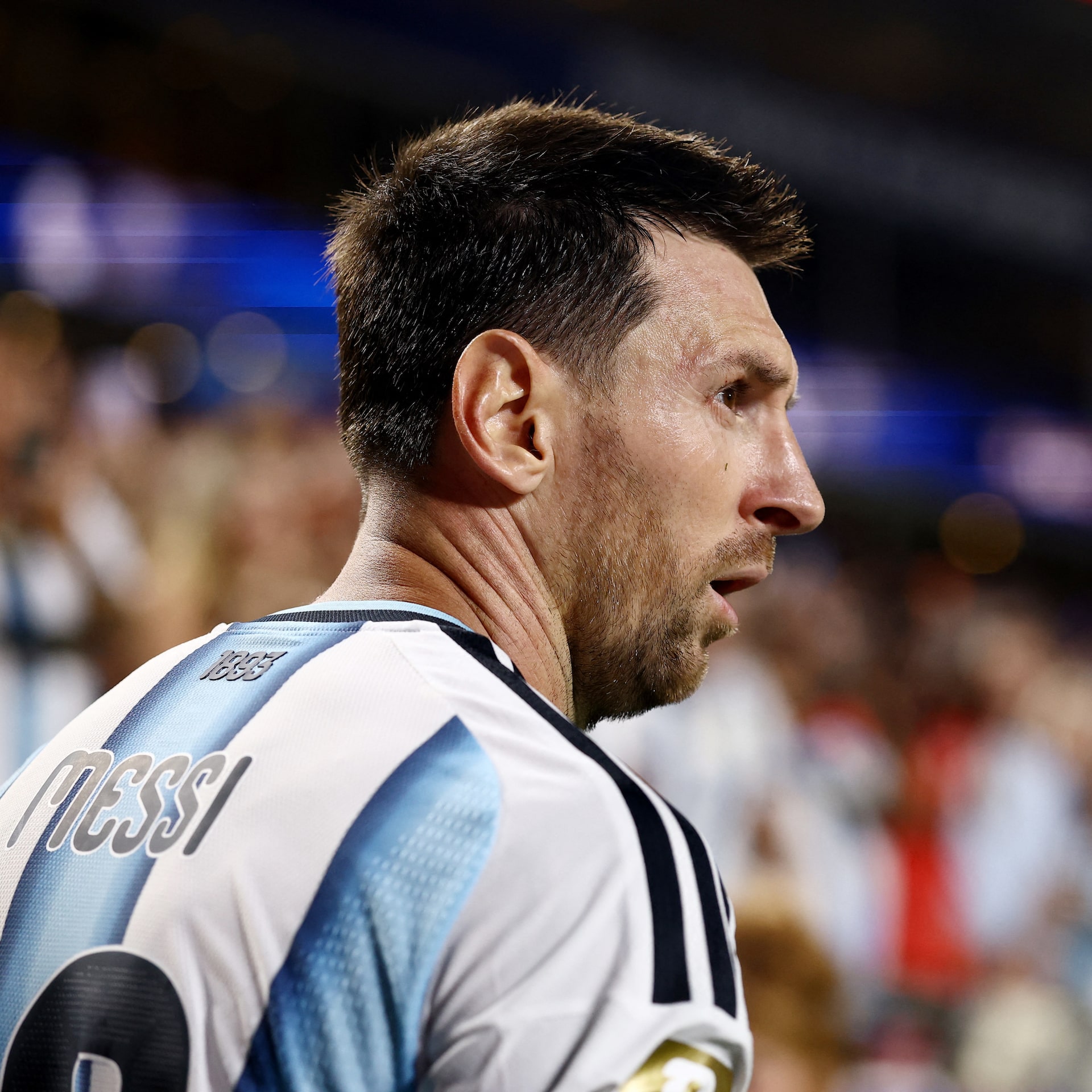Messi preparing to take possession while England’s midfield closes the space around him