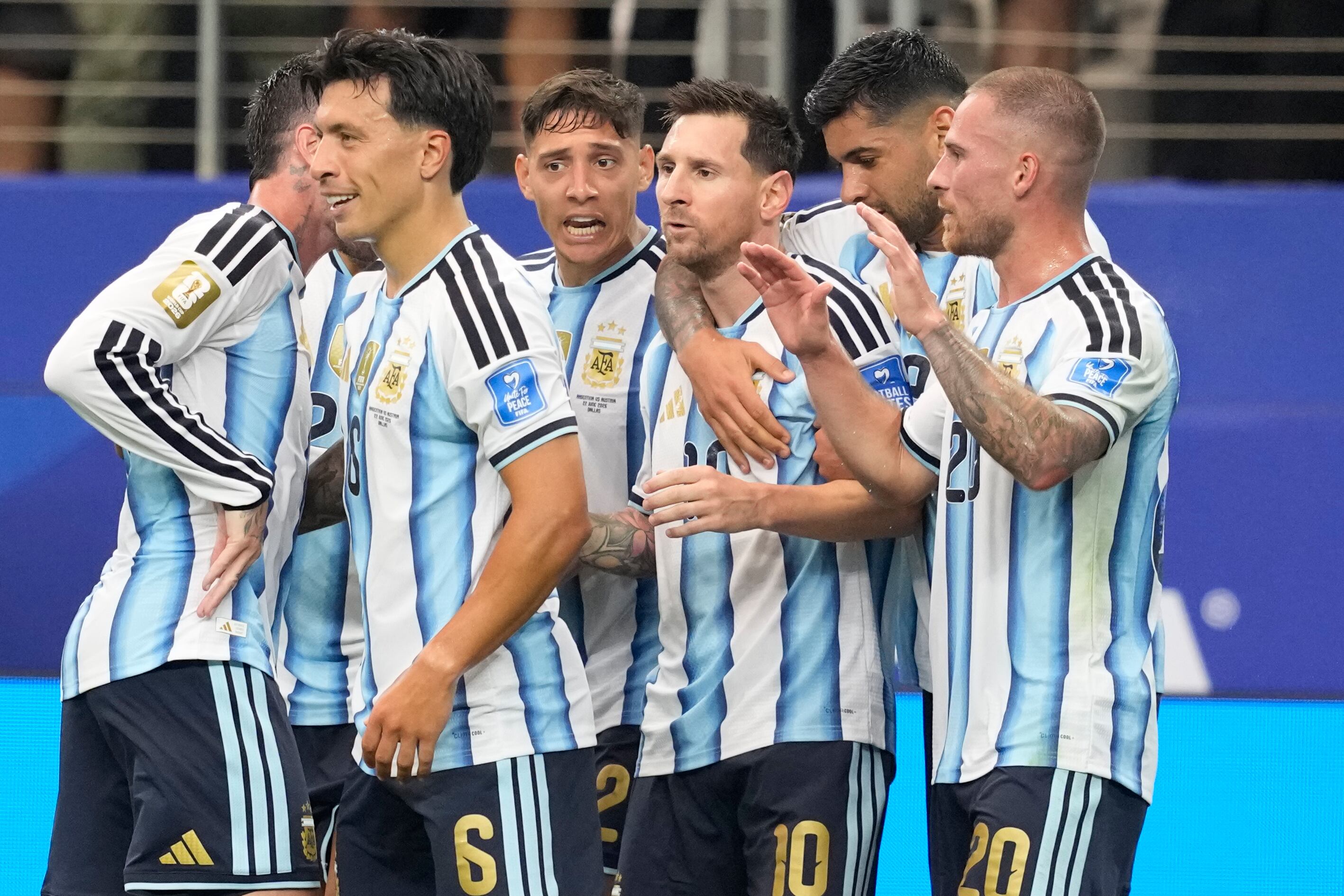 Argentina midfielders and forwards pressing together during an intense World Cup match